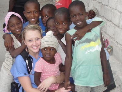 Kaci with Haitian Children